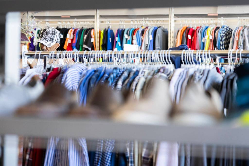 Racks of clothing and shoes fill the back area of Goodwill on Monday, Aug. 3, 2026, in Everett, Washington. (Olivia Vanni / The Herald)
