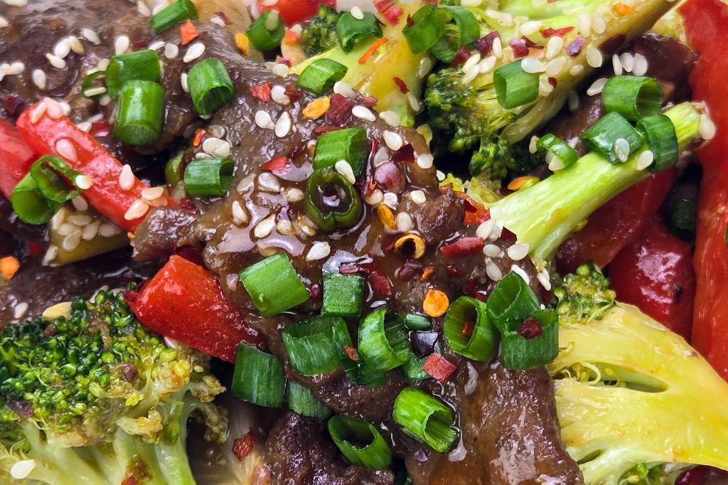 Serve over jasmine rice and garnish with sliced green onions. (Roy Mosby)