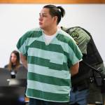 William Russell-Leonard is walked into the courtroom at the Snohomish County Courthouse in handcuffs for his sentencing after pleading guilty in July to two counts of vehicular homicide, second degree assault and possession of a stolen vehicle on Tuesday, Aug. 11, 2026 in Snohomish, Washington. (Olivia Vanni / The Herald)