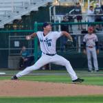 AquaSox pitcher Adam Maier delivers a pitch during a 16-2 win against the Spokane Indians at Everett Memorial Stadium on Aug. 11, 2026. (Joe Pohoryles / The Herald)