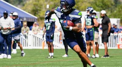 Seattle Seahawks tight end Elijah Arroyo runs with the ball during a practice on Monday, Aug. 10, 2026 at the Virginia Mason Athletic Center in Renton. (Edwin Hooper / Seattle Seahawks)