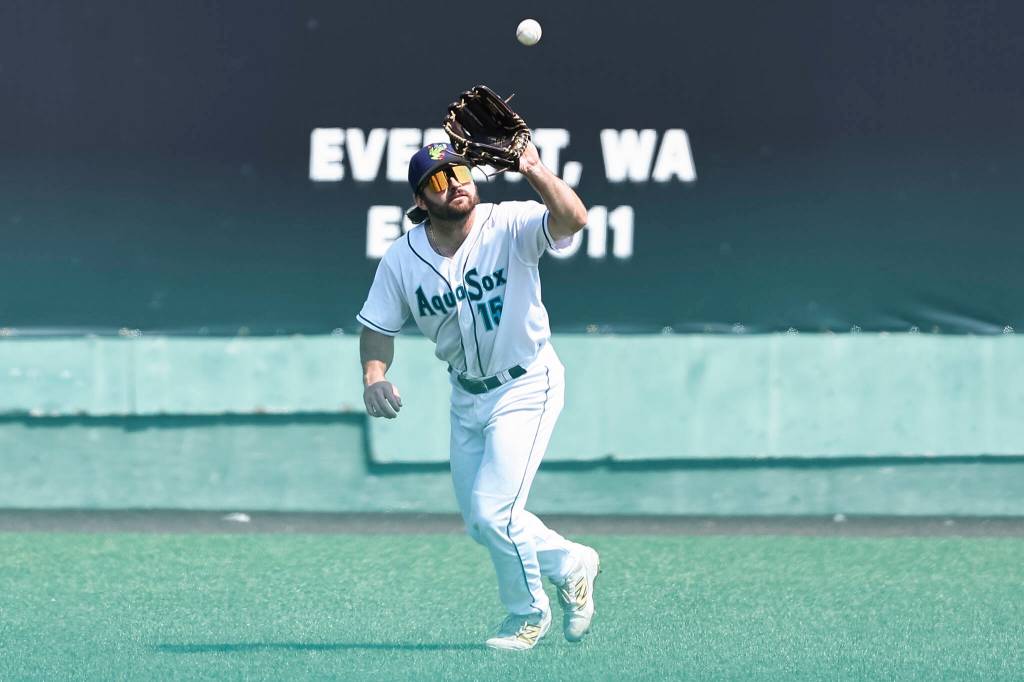 Aiden Taurek #15 of the Everett AquaSox makes a catch in the outfield during the game against the Spokane Indians on Thursday, Aug. 13, 2026 in Everett, Washington. (Olivia Vanni / The Herald)