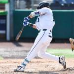 Axel Sanchez #21 of the Everett AquaSox hits during the game against the Spokane Indians on Thursday, Aug. 13, 2026 in Everett, Washington. (Olivia Vanni / The Herald)