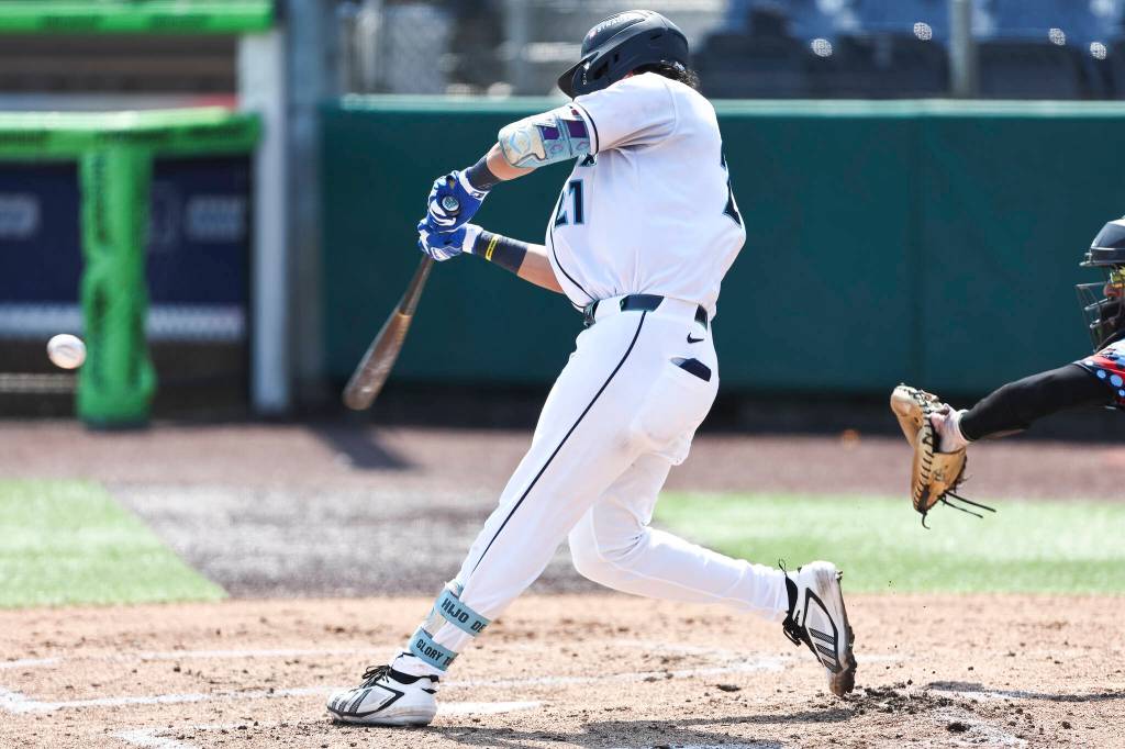 Axel Sanchez #21 of the Everett AquaSox hits during the game against the Spokane Indians on Thursday, Aug. 13, 2026 in Everett, Washington. (Olivia Vanni / The Herald)