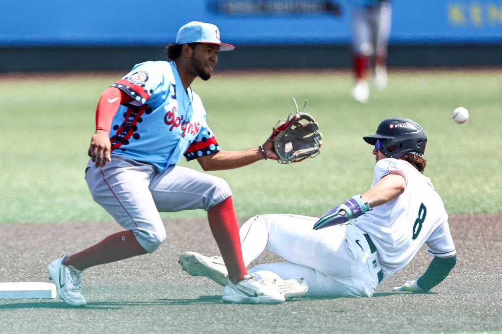 Luis Suisbel #8 of the Everett AquaSox safely slides into second base during the game against the Spokane Indians on Thursday, Aug. 13, 2026 in Everett, Washington. (Olivia Vanni / The Herald)